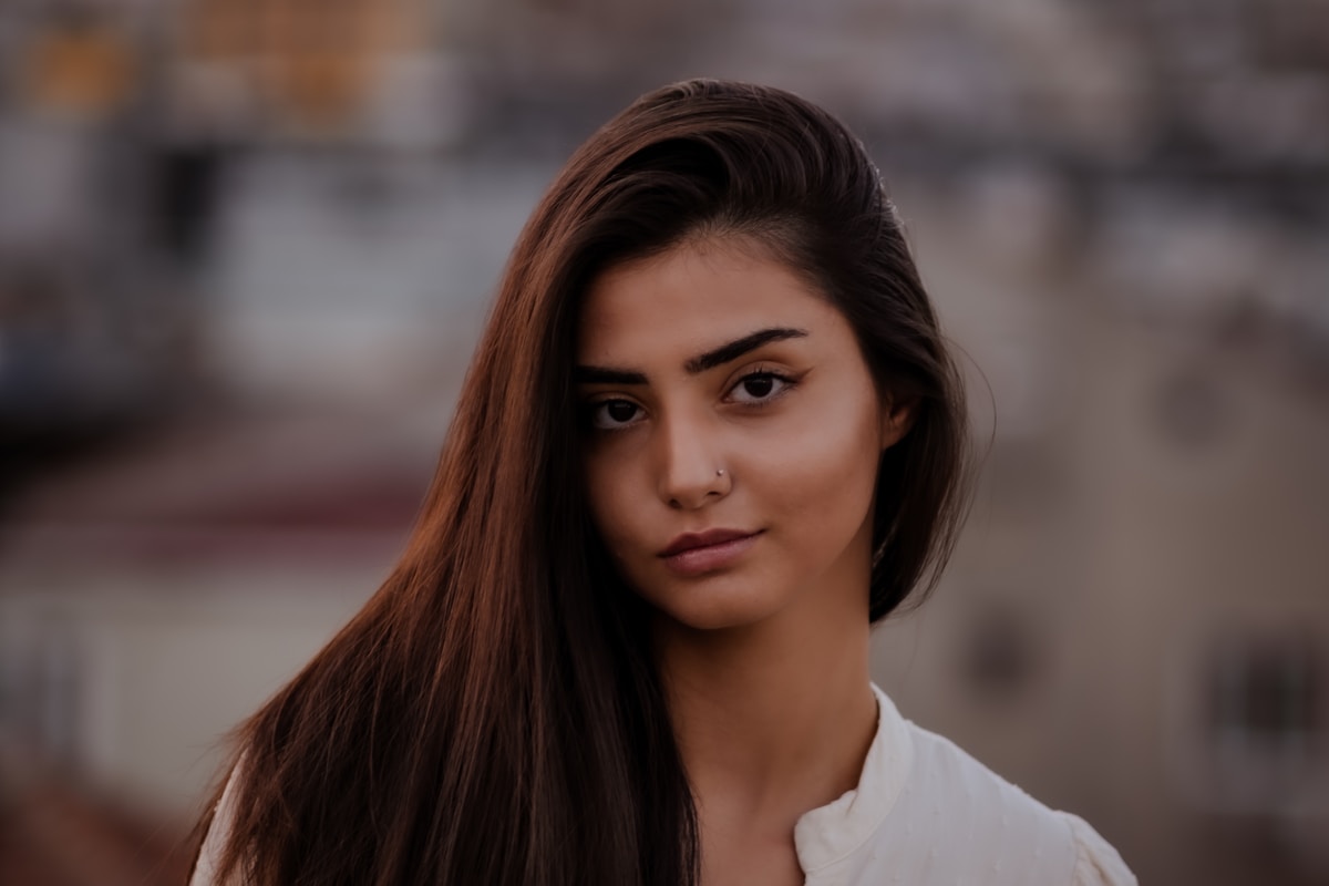 Bartender using fresh herbs and sustainable garnishes